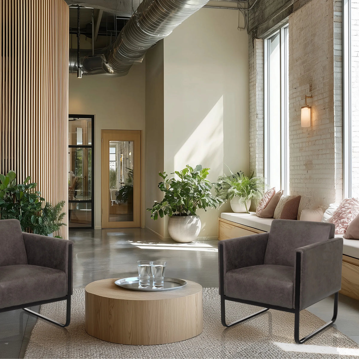 Twee grijze Aruba Retro Lounge stoelen met zwarte metalen frames in een moderne wachtruimte van hjh OFFICE