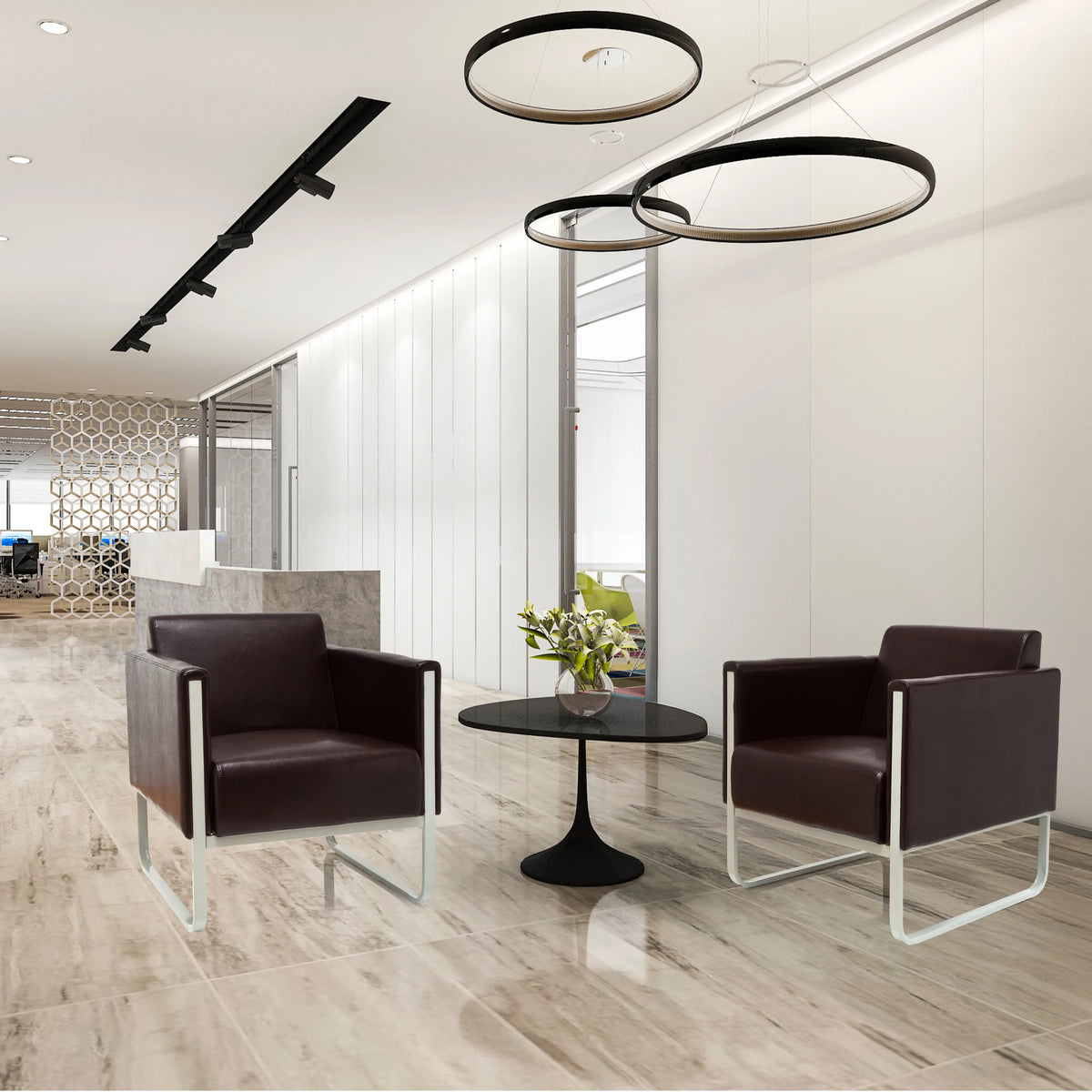 Twee bruine ARUBA gestoffeerde fauteuils met zilverkleurige metalen frames en een ronde bijzettafel van hjh OFFICE