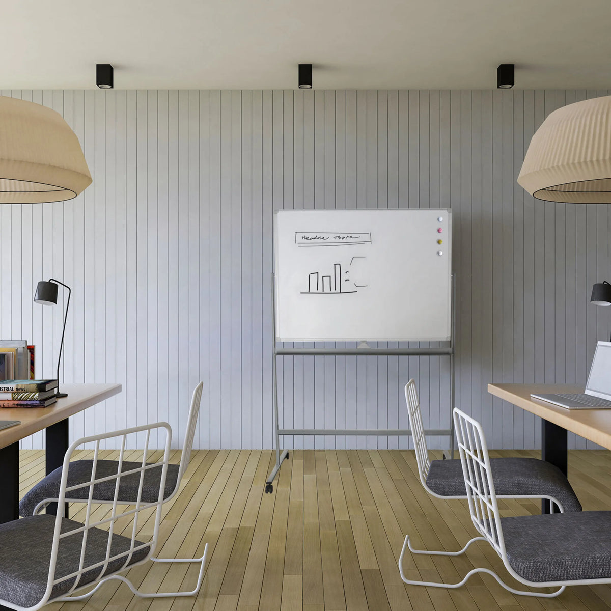 Whiteboard MULTIBOARD I in wit en zilver op een onderstel met wieltjes in een moderne kantoorruimte van hjh OFFICE