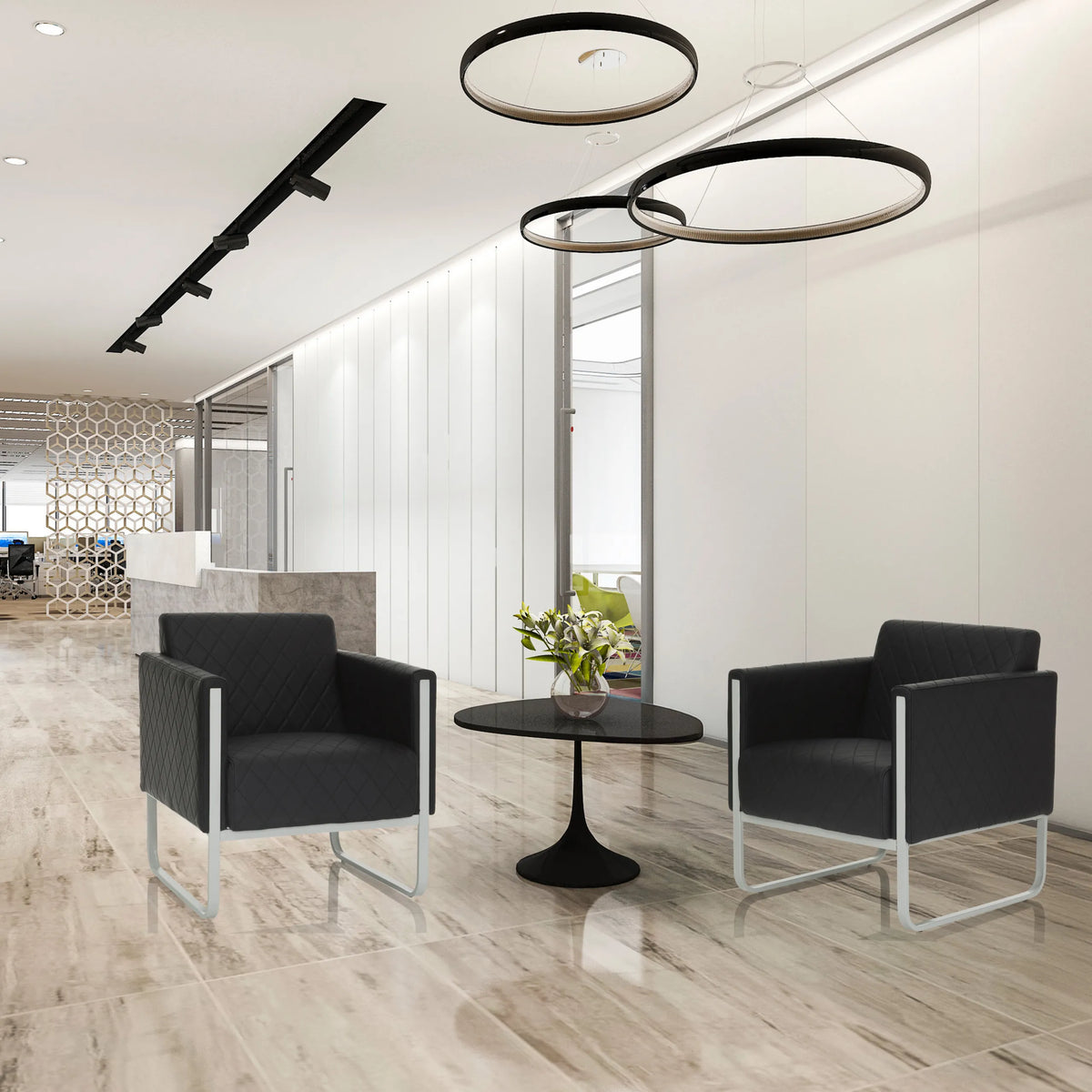 Twee zwarte ARUBA STEP gestoffeerde fauteuils met sleeonderstel en gewatteerde bekleding van hjh OFFICE
