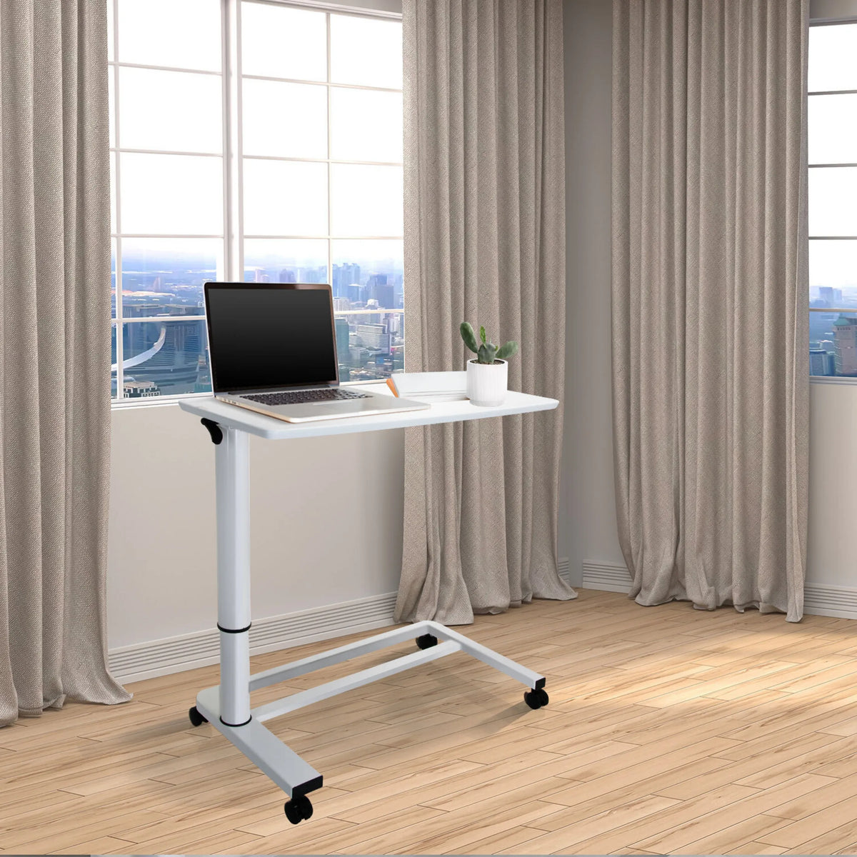 Wit Zit- Sta bureau STAND II met wieltjes en laptop op een lichte houten vloer van hjh OFFICE