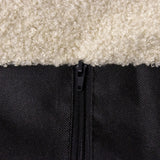 Rits en materiaalovergang tussen beige pluche en zwarte stof van de Kattengrot PAWY EB van hjh LIVING
