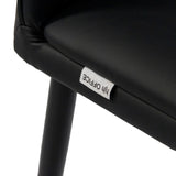 Merklabel op de zwarte bekleding van de Eetkamerstoel VISETO van hjh LIVING