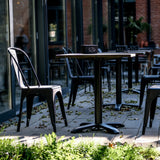 Zwarte Bistrostoel VANTAGGIO BRUSH met bijpassende tafel in de buitenlucht van hjh OFFICE