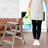 Drietraps aluminium klaptrap SOLID naast een persoon met een schoonmaakemmer van hjh OFFICE