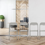 Grijze PVC klapstoelen TUDELA BASIC in een moderne kantooromgeving van hjh OFFICE