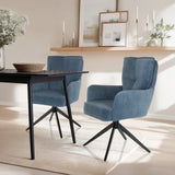 Twee blauwe TARUGO gestoffeerde stoelen met corduroy bekleding en zwart stervormig onderstel van hjh LIVING