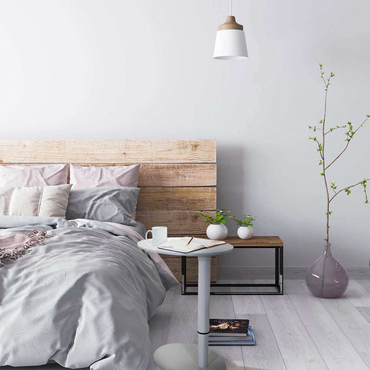 Wit Zit- Sta bureau STAND III met rond blad naast een bed van hjh OFFICE