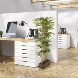 Groene Kunstplant BAMBUS I in een donker houten pot voor op kantoor van hjh OFFICE