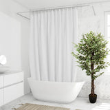 Groene kunstplant FICUS in een zwarte pot in de badkamer van hjh OFFICE