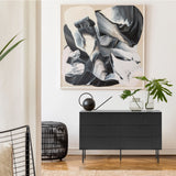 Zwart dressoir KARBY S met drie laden en slanke poten van hjh LIVING