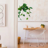 Groene Kunstplant MONSTERA CLIMB in een hangpot van hjh OFFICE