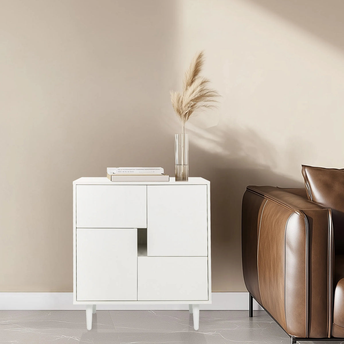 Witte commode LYKKJA met asymmetrisch frontontwerp en vier poten van hjh LIVING