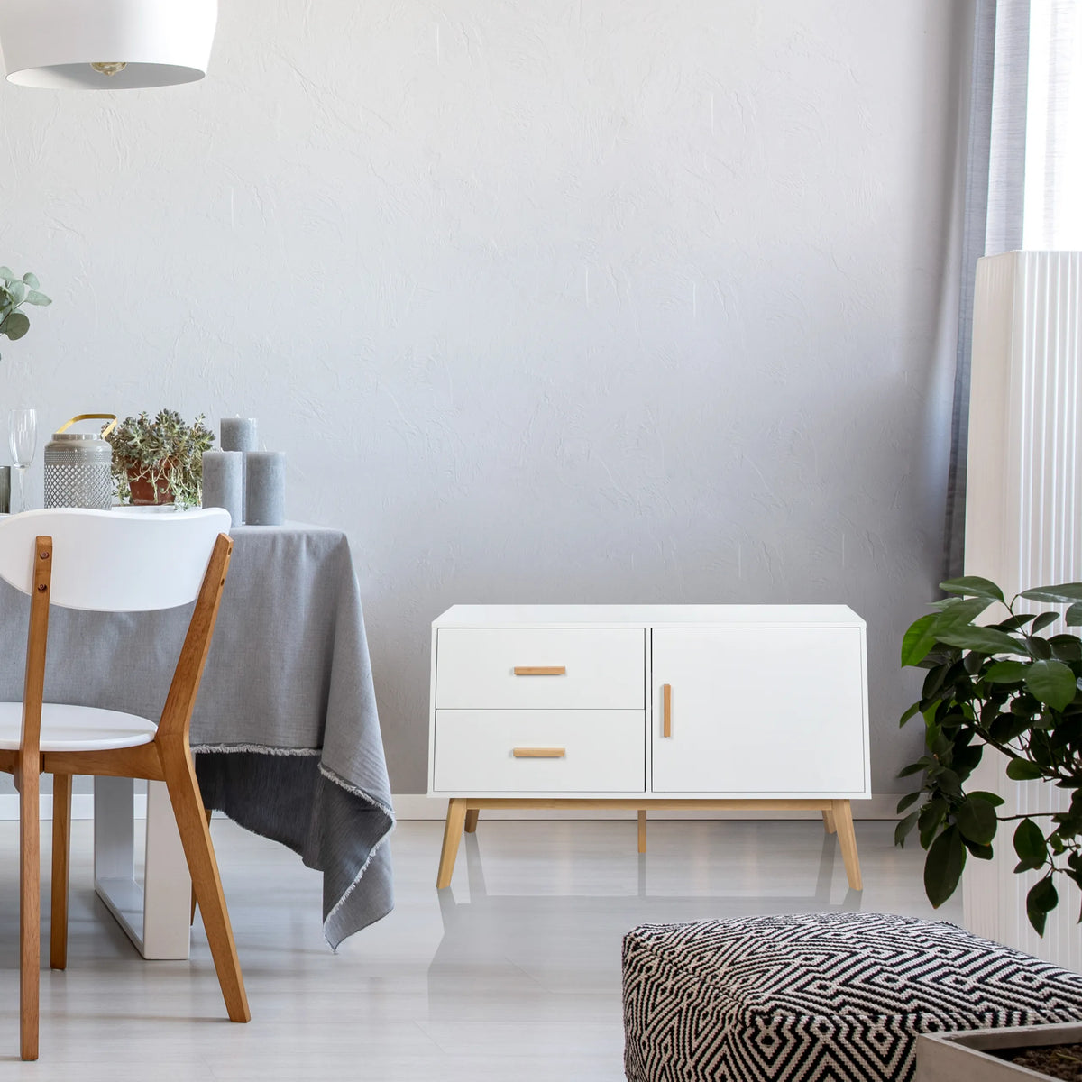 Wit Dressoir TAROLO met twee laden, een deur en lichte houten poten van hjh LIVING