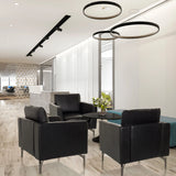 Drie zwarte BAVERO Lounge stoelen van kunstleer in een moderne kantoorlounge van hjh OFFICE