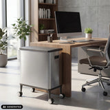 Zilveren prullenbak Clean Mobile op wieltjes onder een bureau van hjh OFFICE (AI-gegenereerde afbeelding)