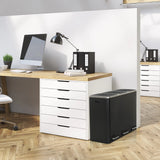 Zwarte Prullenbak Clean 9 met twee vakken naast een bureau van hjh OFFICE
