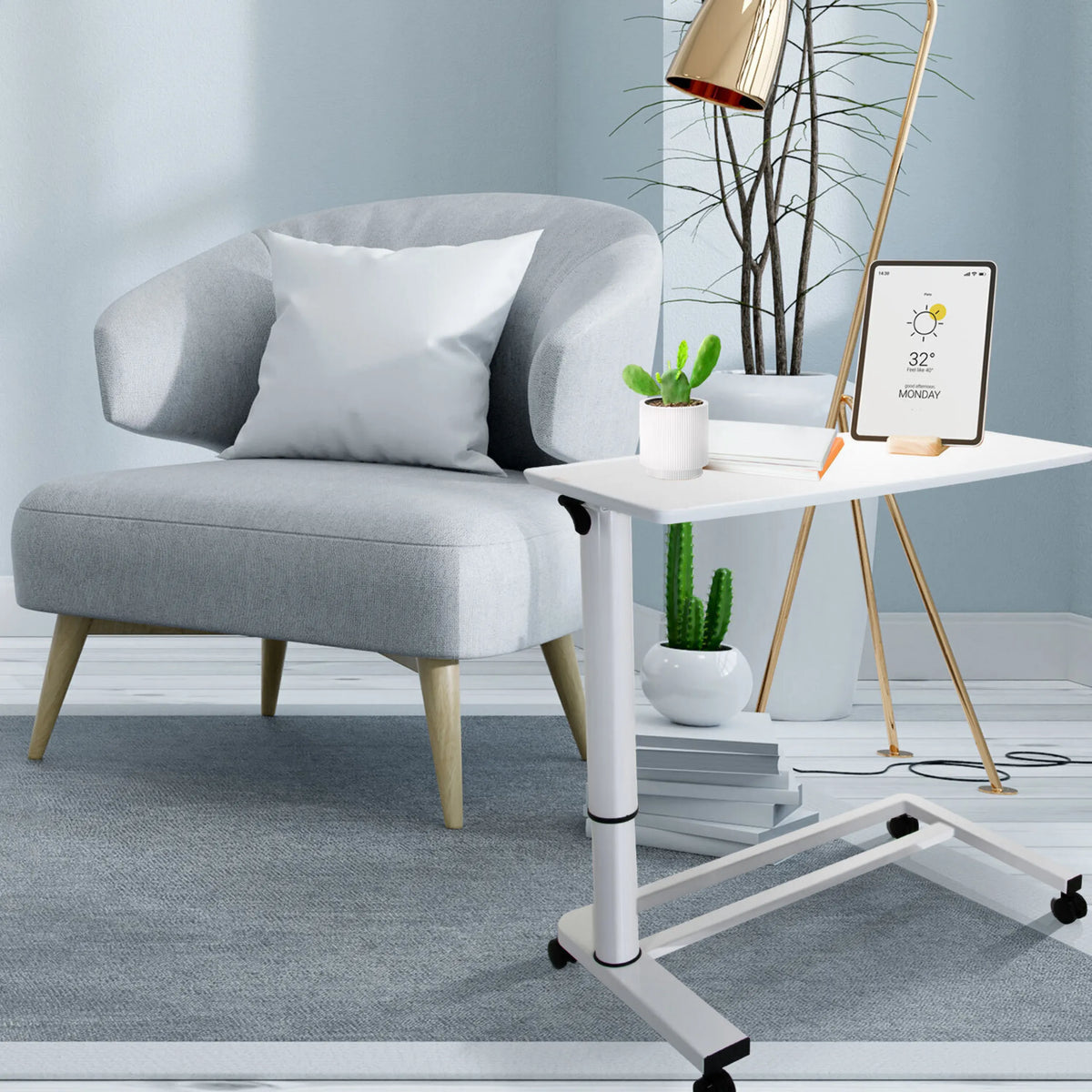 Wit Zit- Sta bureau STAND II op wieltjes naast een grijze fauteuil van hjh OFFICE