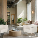 Twee witte Curacao Cord lounge stoelen met metalen frame en een ronde salontafel van hjh LIVING