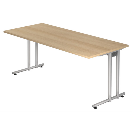 Bureau NANO 19 S met lichtbruin eikenhouten blad en zilverkleurige metalen poten van hjh OFFICE PRO