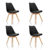 Vier zwarte Shell-stoelen SCANDI 4 met poten van licht hout van hjh OFFICE