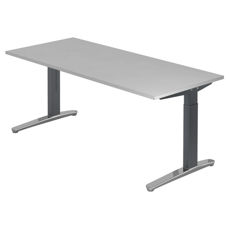 Hoogteverstelbaar bureau XTRA XB 19 GC in grijs met een groot tafelblad van hjh OFFICE PRO