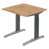 Hoogteverstelbaar bureau XTRA XB 8 GC in essen-eiken met donkergrijs onderstel van hjh OFFICE PRO